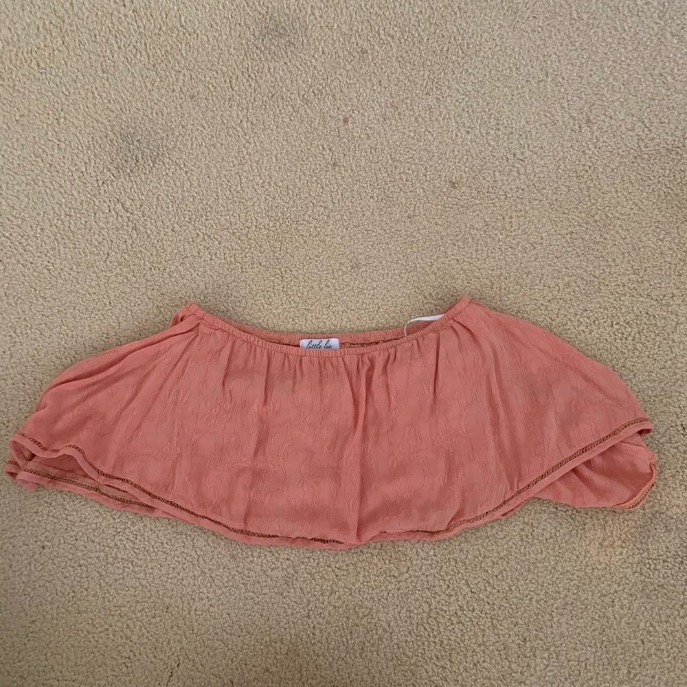 Homecoming Honolulu cop off the shoulder top.